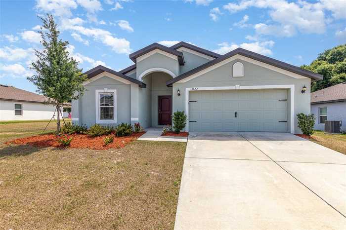 photo 2: 1672 GOPHER TREE STREET, MASCOTTE FL 34753