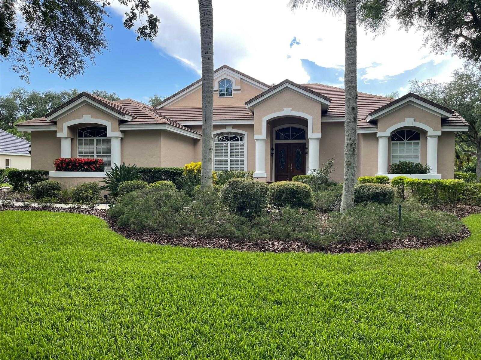 photo 1: 8904 MAGNOLIA CHASE CIRCLE, TAMPA FL 33647