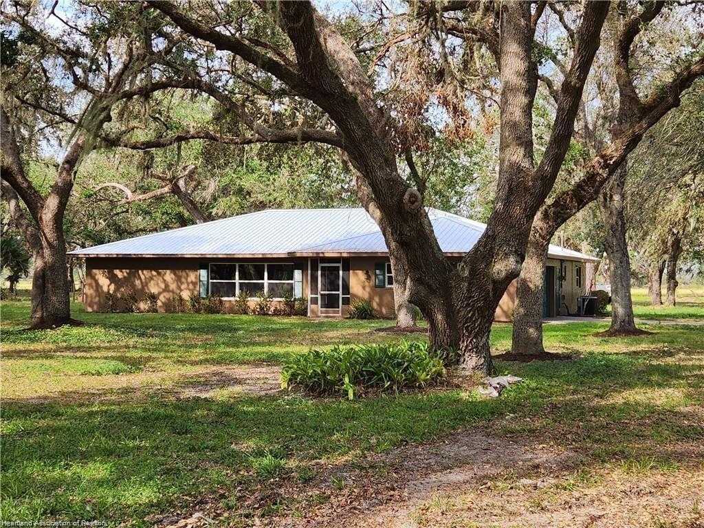 photo 1: 875 COUNTY ROAD 731, VENUS FL 33960