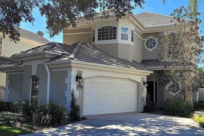 photo 1: 8427 FOXWORTH CIRCLE, ORLANDO FL 32819