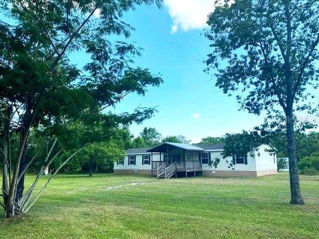 photo 1: 14153 SW 130TH AVENUE, ARCHER FL 32618