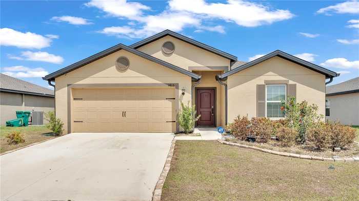 photo 1: 1415 SWAN LAKE CIRCLE, DUNDEE FL 33838