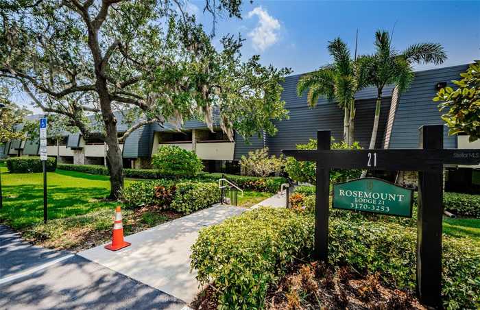 photo 100: 36750 US HIGHWAY 19 N Unit 21-301, PALM HARBOR FL 34684