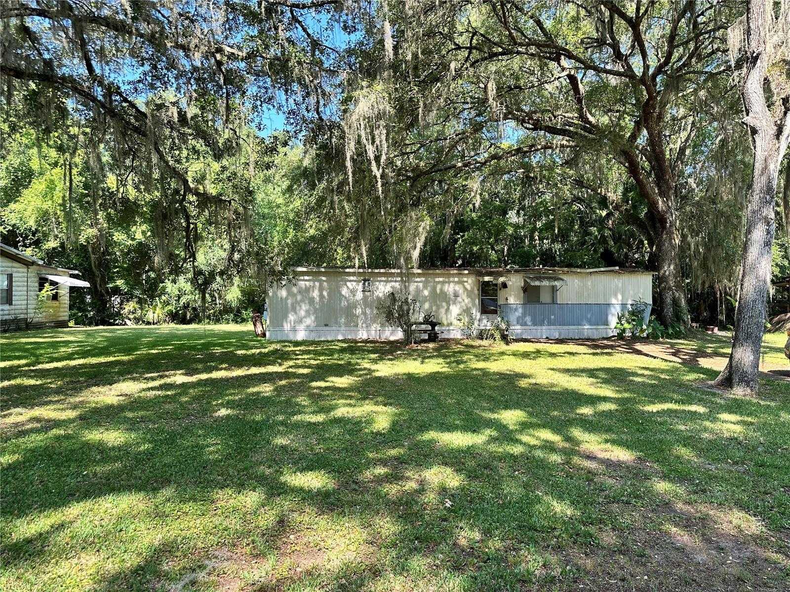 photo 2: 3832 CR 405N, LAKE PANASOFFKEE FL 33538