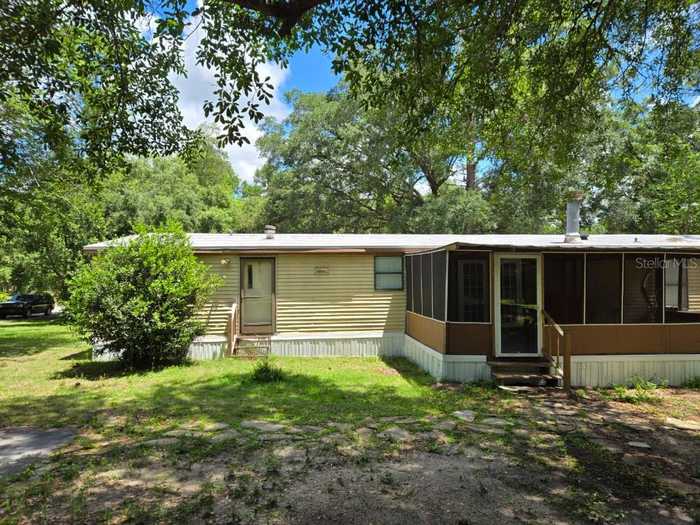 photo 2: 21850 SE 64TH LANE, MORRISTON FL 32668