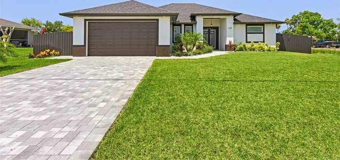 photo 1: 430 NE 5TH PLACE, CAPE CORAL FL 33909