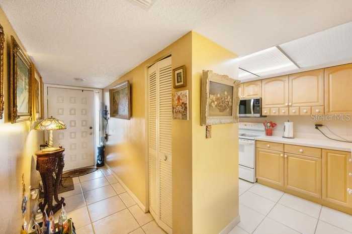 photo 2: 9433 HARBOR GREENS WAY Unit 405, SEMINOLE FL 33776