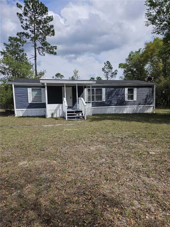 photo 1: 7751 NE 134TH TERRACE, BRONSON FL 32621