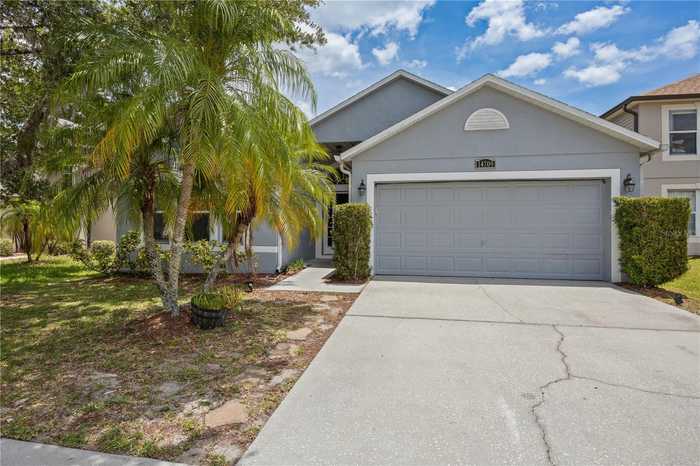 photo 1: 14709 TULLY WOODS COURT, ORLANDO FL 32826