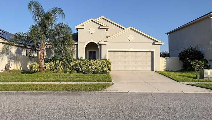 photo 1: 12327 SAWGRASS PRAIRIE LOOP, ORLANDO FL 32824