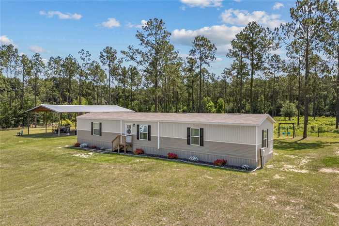 photo 1: 14421 NW 214TH TERRACE, HIGH SPRINGS FL 32643