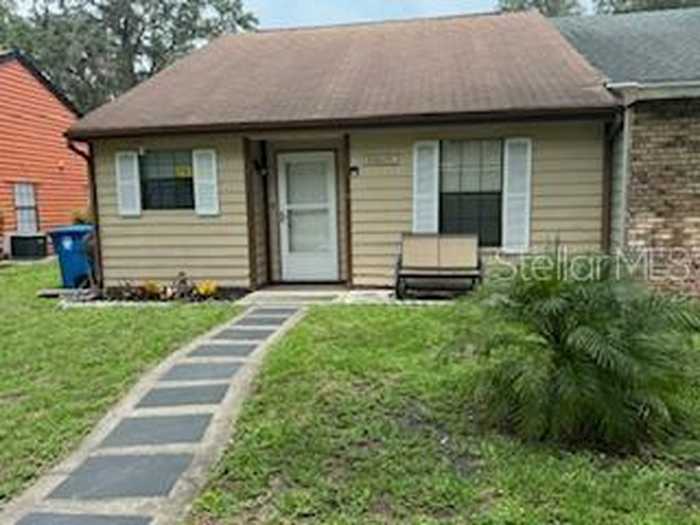 photo 1: 35077 WHISPERING OAKS BOULEVARD, DADE CITY FL 33523