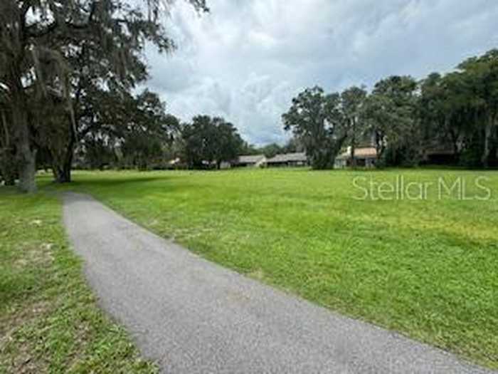 photo 10: 35077 WHISPERING OAKS BOULEVARD, DADE CITY FL 33523