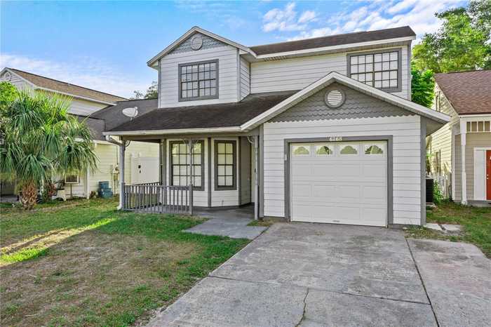 photo 1: 6768 BRITTANY CHASE COURT, ORLANDO FL 32810