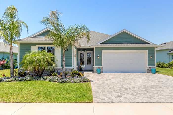 photo 1: 340 VENETIAN PALMS BLVD, NEW SMYRNA BEACH FL 32168