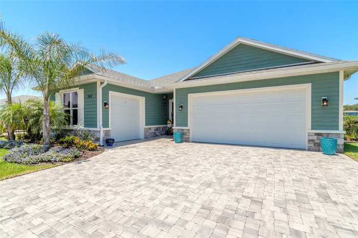 photo 2: 340 VENETIAN PALMS BLVD, NEW SMYRNA BEACH FL 32168