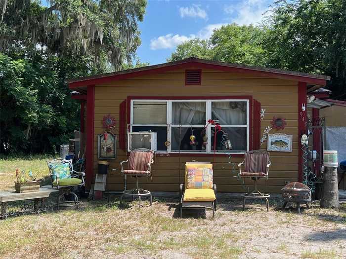 photo 1: 945 CR 482B, LAKE PANASOFFKEE FL 33538