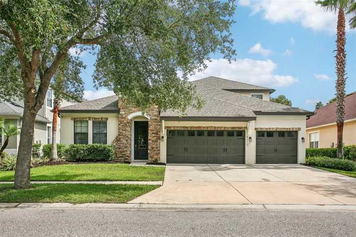 photo 1: 8010 CYPRESS CROSSING COURT, TAMPA FL 33647