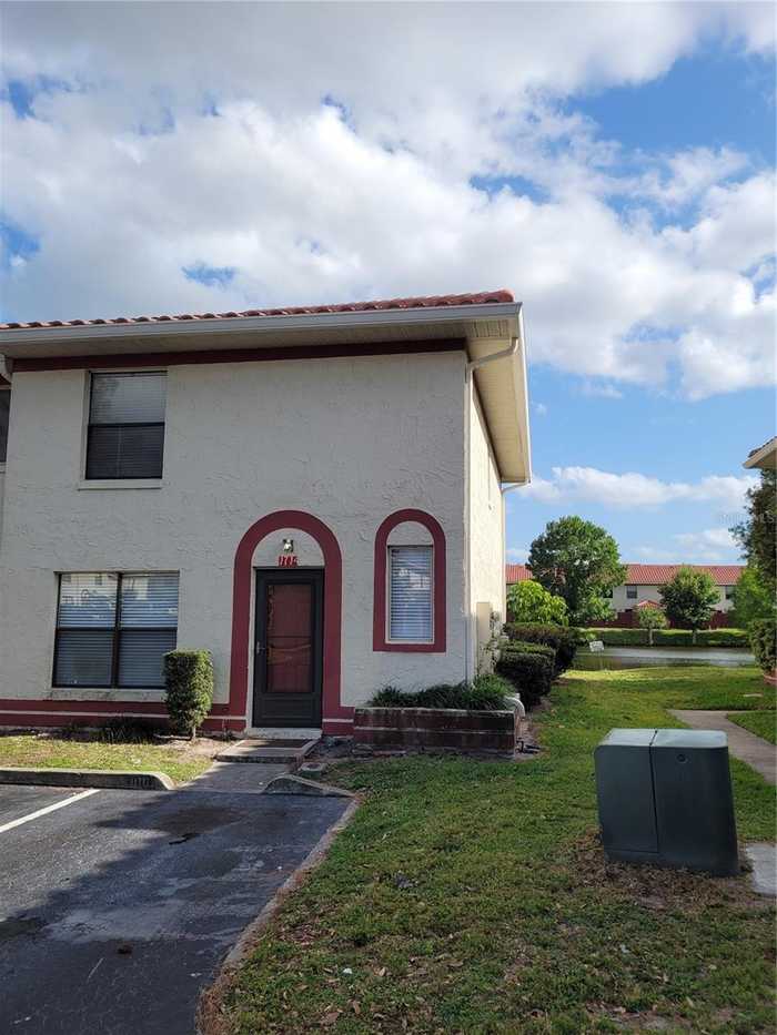 photo 2: 1714 SILVER CREEK COURT Unit 100, ORLANDO FL 32807