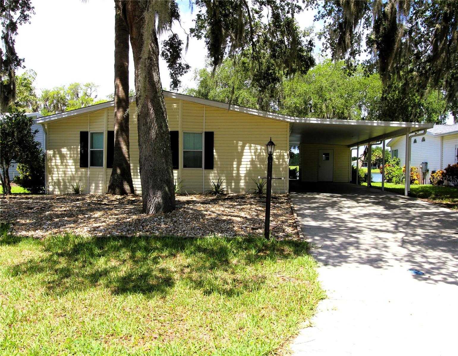 photo 1: 406 SIOUX BOULEVARD, OAK HILL FL 32759