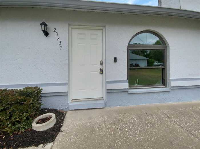 photo 1: 23237 CLUB VILLAS DRIVE, LAND O LAKES FL 34639