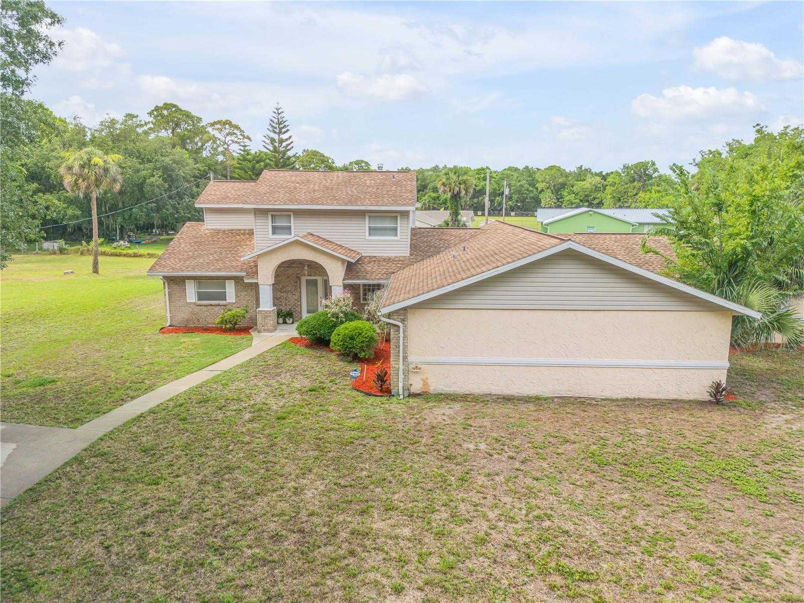 photo 1: 299 W HICKORY AVENUE, OAK HILL FL 32759