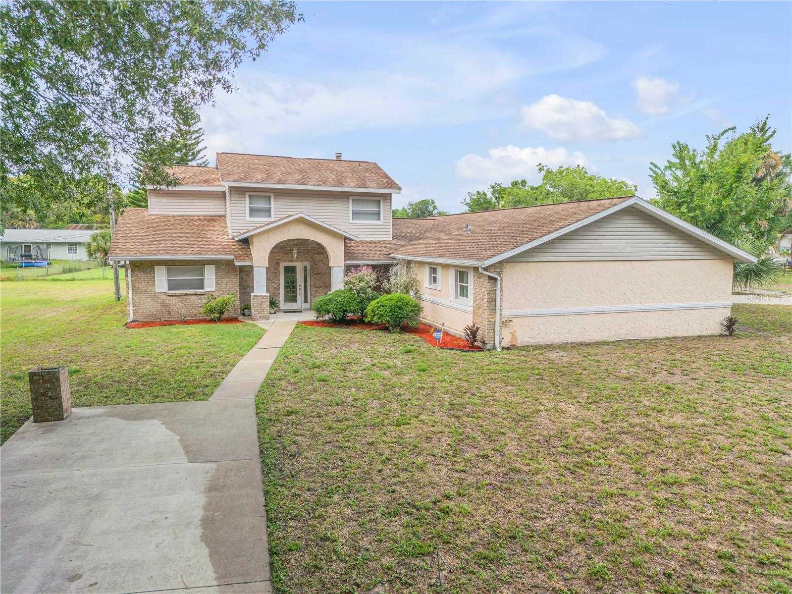 photo 2: 299 W HICKORY AVENUE, OAK HILL FL 32759