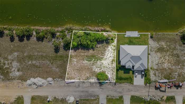 photo 2: 2102 NE 13TH AVENUE, CAPE CORAL FL 33909