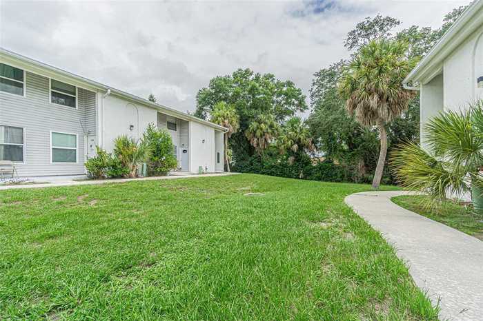 photo 1: 7311 JACKSON SPRINGS ROAD Unit 7311, TAMPA FL 33634