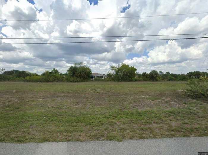 photo 1: 2007 NE 27TH STREET, CAPE CORAL FL 33909