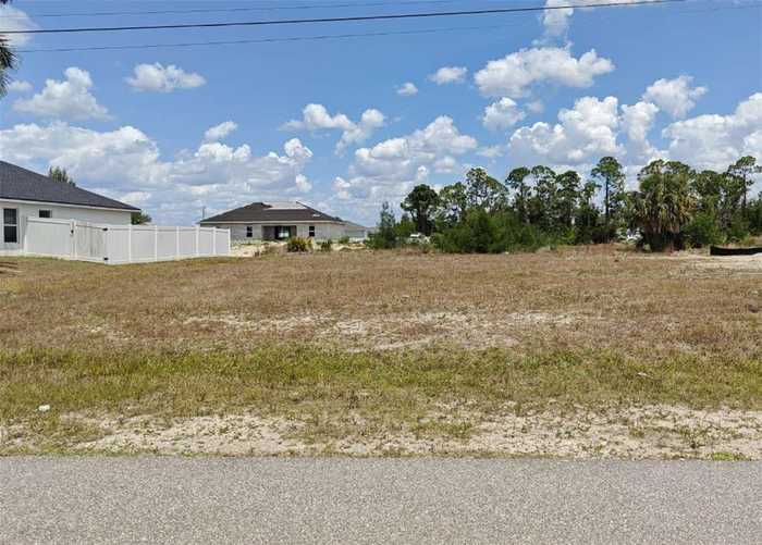 photo 1: 3607 NE 9TH AVENUE, CAPE CORAL FL 33909