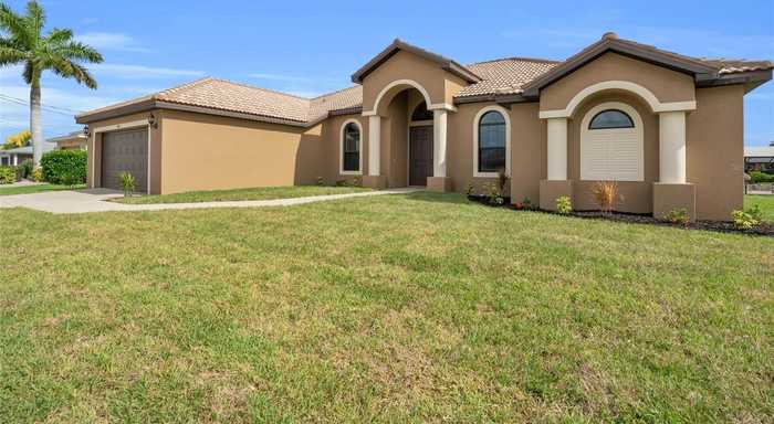 photo 1: 915 SE 33RD TERRACE, CAPE CORAL FL 33904