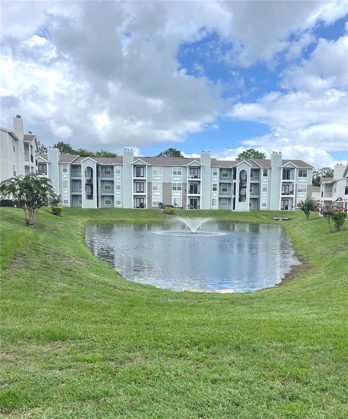 photo 1: 2550 N ALAFAYA TRAIL Unit 4100, ORLANDO FL 32826