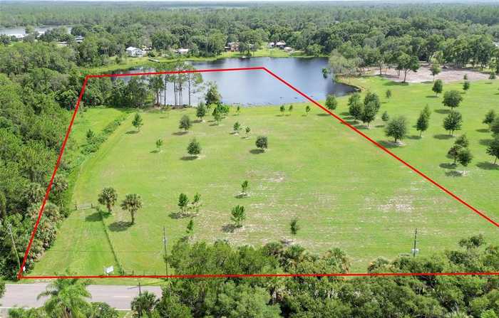 photo 1: 1600 SPRING GARDEN RANCH ROAD, DE LEON SPRINGS FL 32130