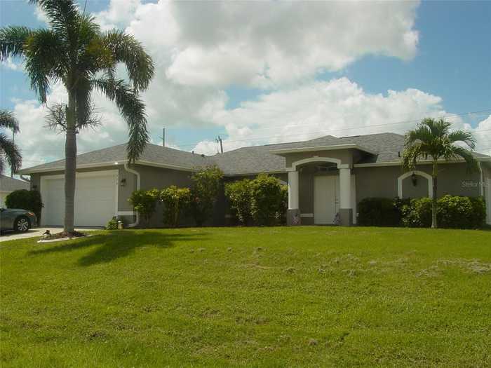 photo 1: 220 NE 24TH TERRACE, CAPE CORAL FL 33909