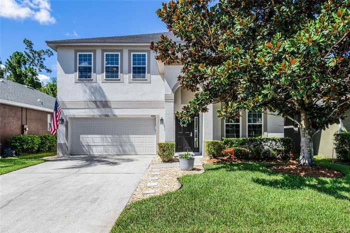 photo 1: 10140 CYPRESS VINE DRIVE, ORLANDO FL 32827