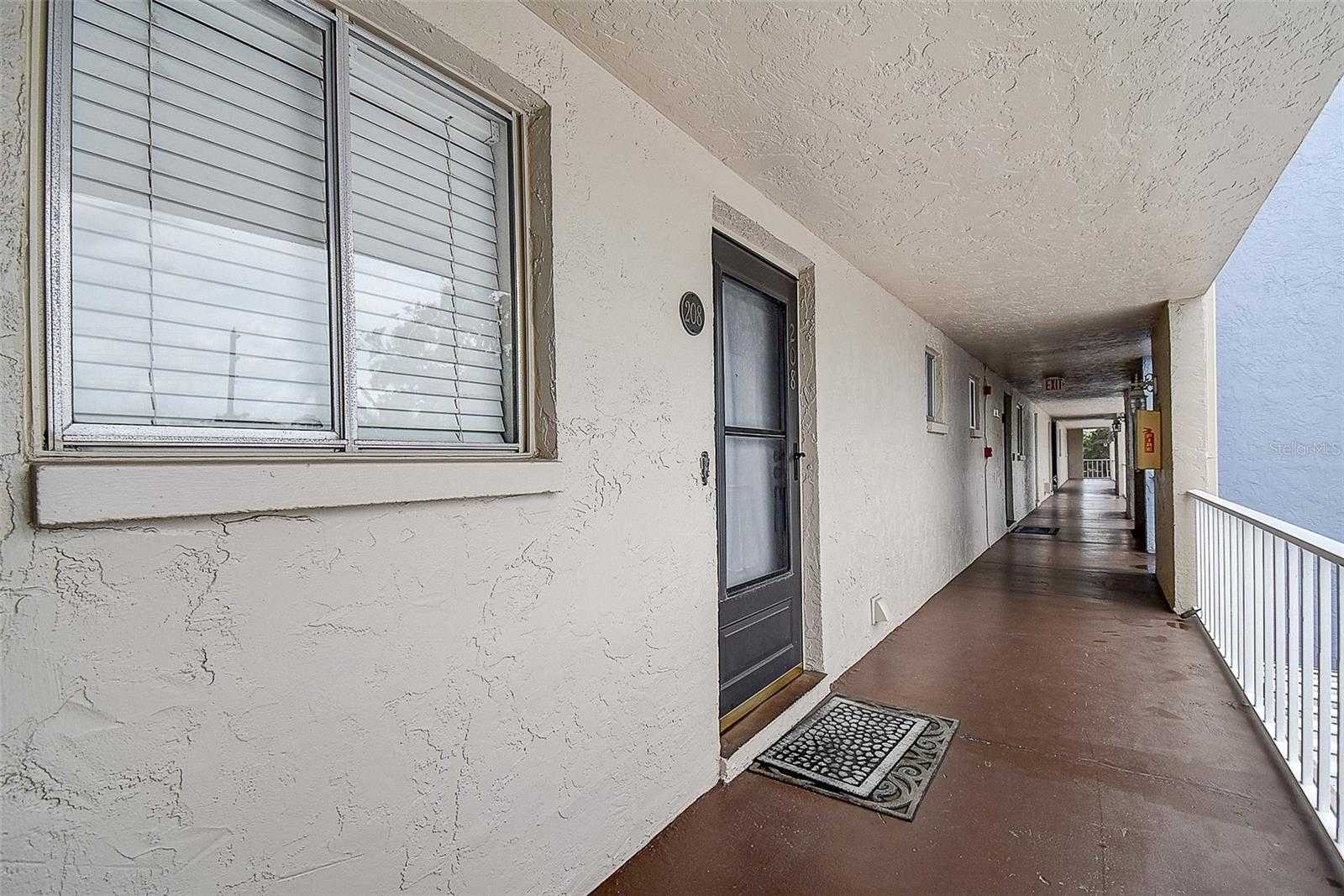 photo 3: 215 VALENCIA BOULEVARD Unit 208, BELLEAIR BLUFFS FL 33770