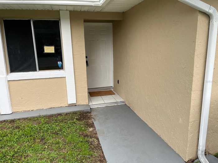 photo 1: 5817 WILLOW BUD CT Unit 5817, ORLANDO FL 32807