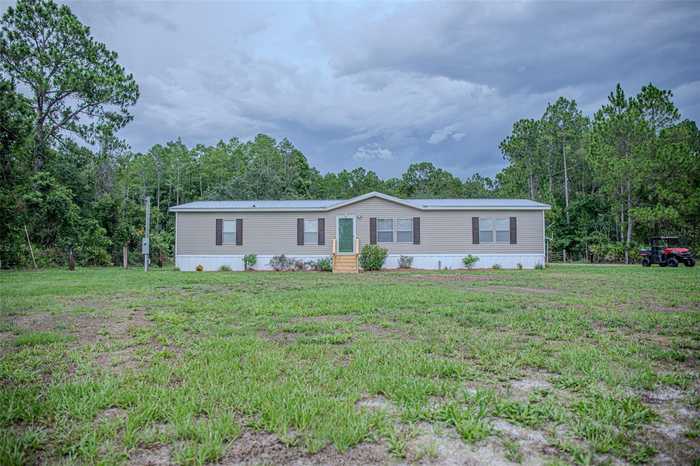 photo 1: 12881 OLD GRADE ROAD, POLK CITY FL 33868