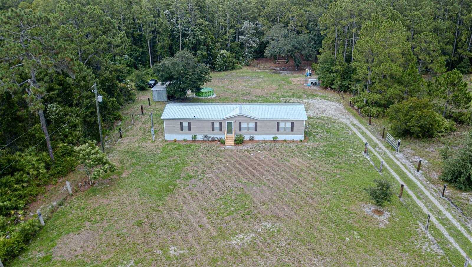 photo 3: 12881 OLD GRADE ROAD, POLK CITY FL 33868