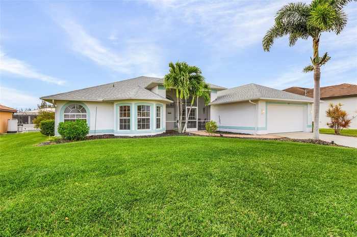 photo 2: 702 NW 38TH PLACE, CAPE CORAL FL 33993