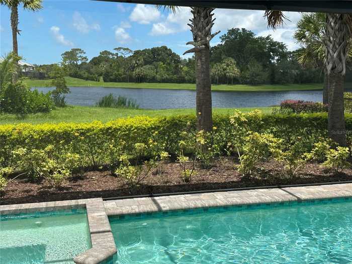 photo 1: 6270 RIVO LAKES BOULEVARD, SARASOTA FL 34241