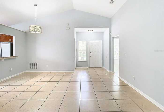 photo 2: 428 SHORT PINE CIRCLE, ORLANDO FL 32807