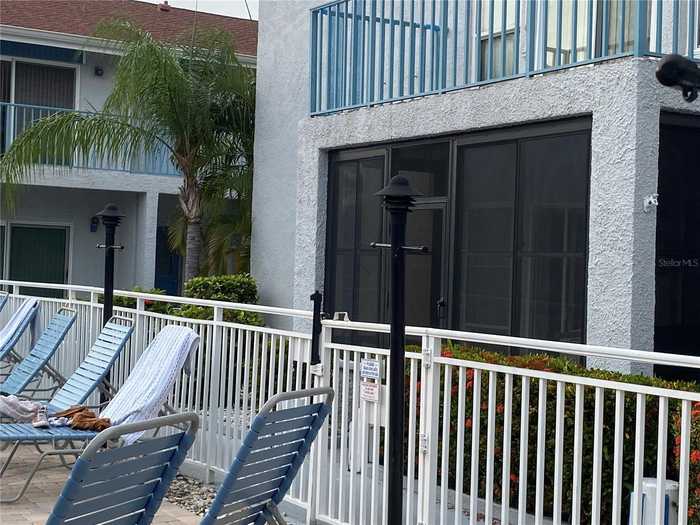 photo 1: 230 MEDALLION BOULEVARD Unit D, MADEIRA BEACH FL 33708