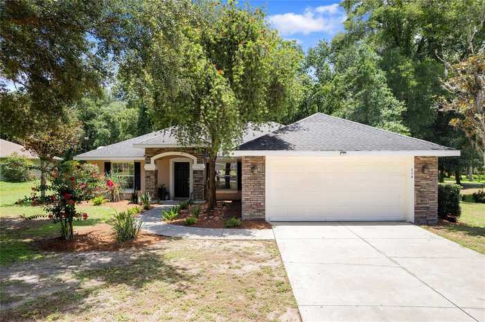 photo 1: 306 BROOKSTONE LANE, FRUITLAND PARK FL 34731