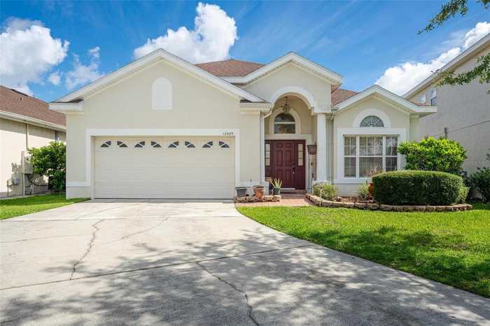 photo 1: 12329 ACCIPITER DRIVE, ORLANDO FL 32837