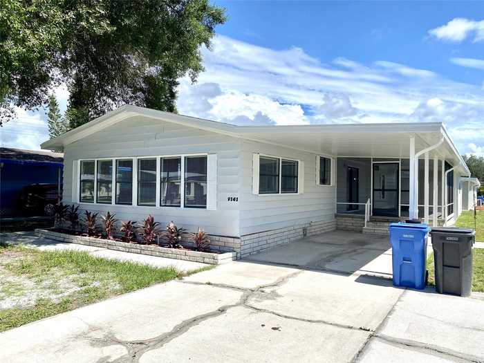 photo 1: 9141 OTTER PASS, TAMPA FL 33626