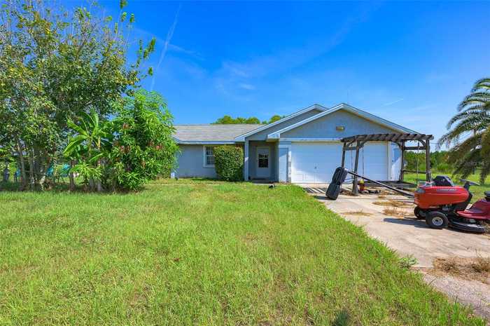 photo 1: 4503 TREEBROOK ROAD, NEW SMYRNA BEACH FL 32168