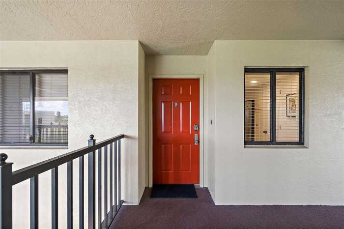 photo 1: 7434 BAYSHORE DRIVE Unit 404, TREASURE ISLAND FL 33706