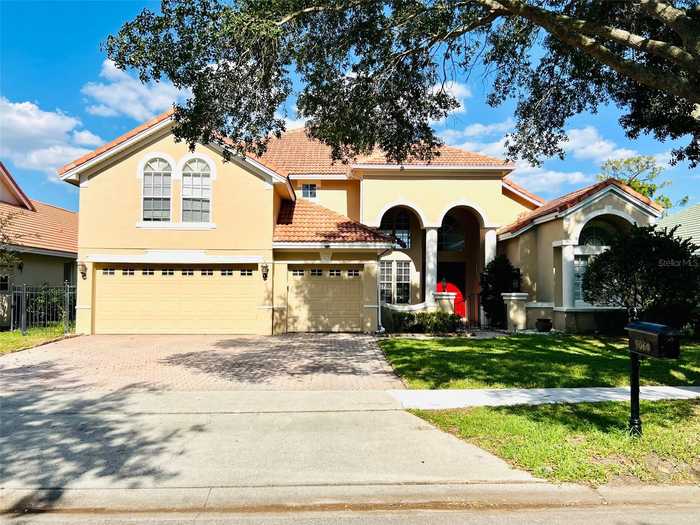 photo 1: 9060 HERITAGE BAY CIRCLE, ORLANDO FL 32836